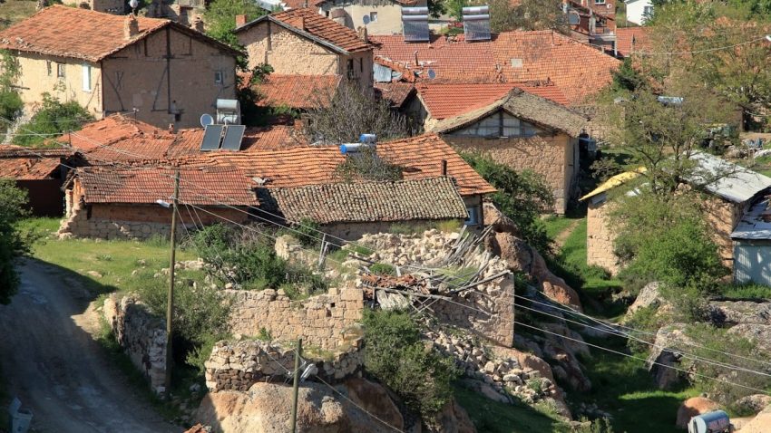 An aerial view of a small village in the mountains